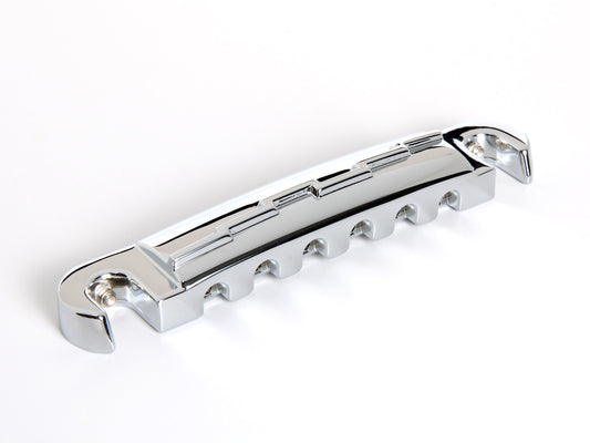 OEM lightning bar wraparound tailpiece compensated for unwound G string, chrome-plated zinc, front