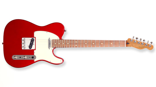 Red electric guitar on a white background